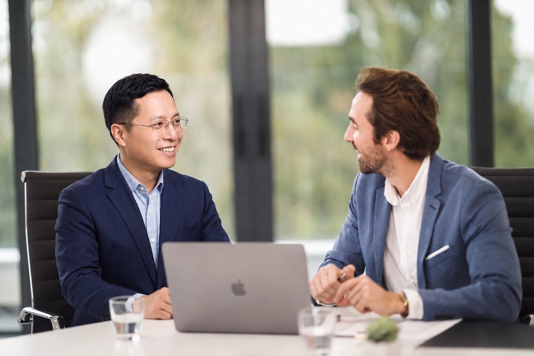 Ethan Vo meeting with a client